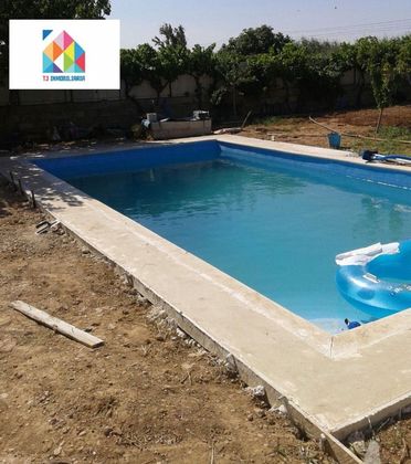 Foto 2 de Casa en venta en urbanización Hoya Pinseque de 3 habitaciones con piscina y jardín
