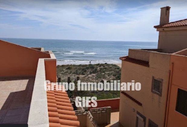 Foto 1 de Venta de casa adosada en calle Vall de Agres de 4 habitaciones con terraza y piscina