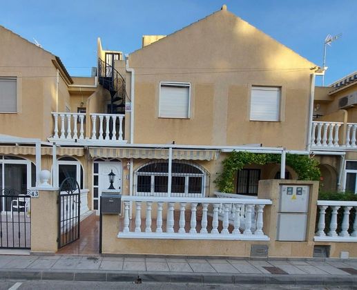 Foto 1 de Casa adossada en venda a urbanización Jardín del Mar Playa de 3 habitacions amb terrassa i piscina
