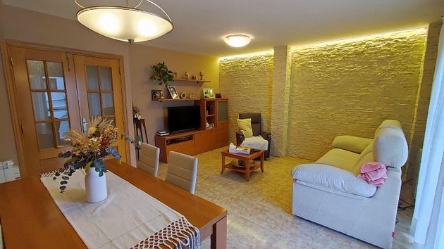 Foto 1 de Casa adosada en venta en Es Grau-Sierra Morena de 4 habitaciones con terraza y garaje