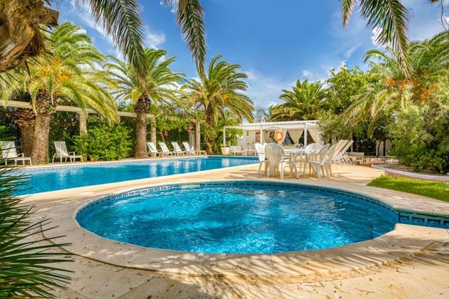 Foto 1 de Xalet en venda a Cala En Blanes de 5 habitacions amb terrassa i piscina