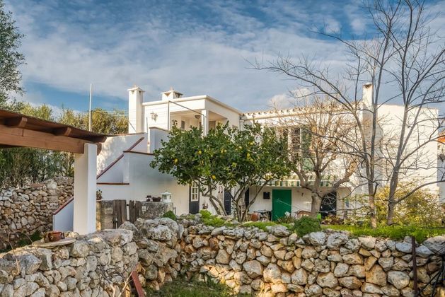 Foto 1 de Casa adossada en venda a Sant Lluís de 3 habitacions amb terrassa i garatge