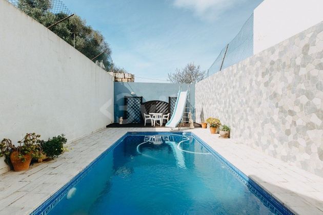 Foto 1 de Casa adosada en venta en Ciutadella de 5 habitaciones con terraza y piscina