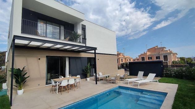 Foto 1 de Venta de casa adosada en Maioris-Puig de Ros de 4 habitaciones con terraza y piscina