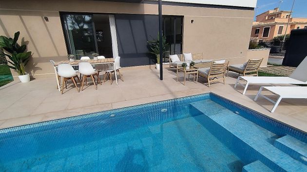 Foto 2 de Venta de casa adosada en Maioris-Puig de Ros de 4 habitaciones con terraza y piscina