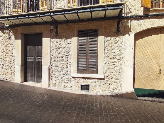 Foto 2 de Casa adosada en venta en Lloseta de 5 habitaciones con piscina y garaje