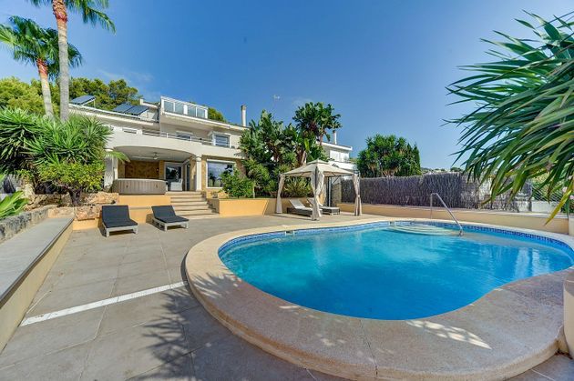 Foto 1 de Chalet en venta en Cas Catala - Illetes de 4 habitaciones con piscina y jardín