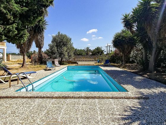 Foto 1 de Chalet en venta en El Coll d'en Rabassa de 4 habitaciones con terraza y piscina