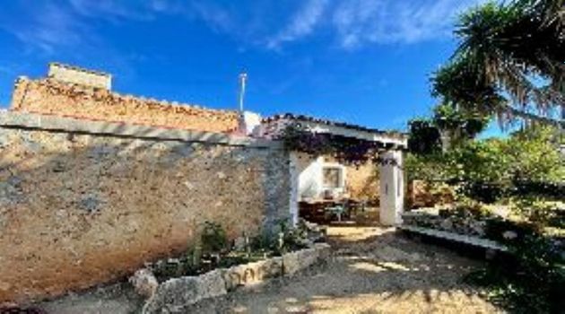 Foto 1 de Chalet en venta en Sant Joan de Labritja de 6 habitaciones con terraza y piscina