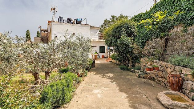 Foto 1 de Casa adosada en venta en Pollença de 5 habitaciones con terraza y jardín