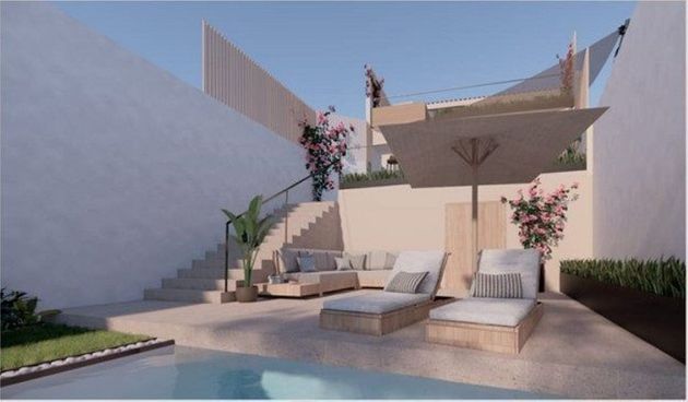 Foto 2 de Venta de casa adosada en Campanet de 4 habitaciones con terraza y piscina