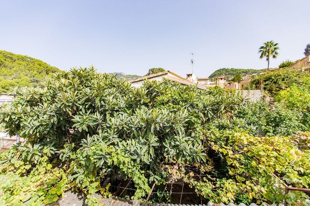 Foto 1 de Casa adossada en venda a Puigpunyent de 4 habitacions amb terrassa i jardí