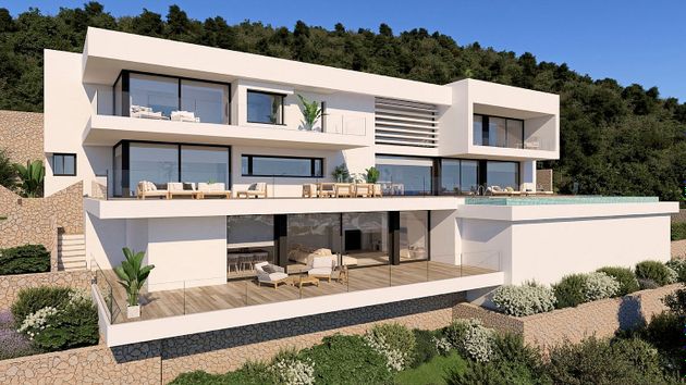Foto 2 de Chalet en venta en urbanización Cumbre del Sol de 5 habitaciones con terraza y piscina