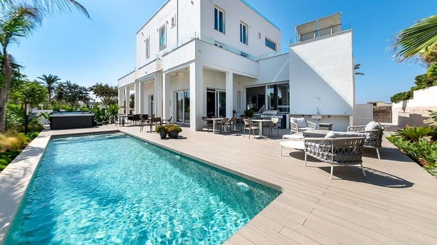 Foto 1 de Casa en venta en El Coll d'en Rabassa de 5 habitaciones con terraza y piscina