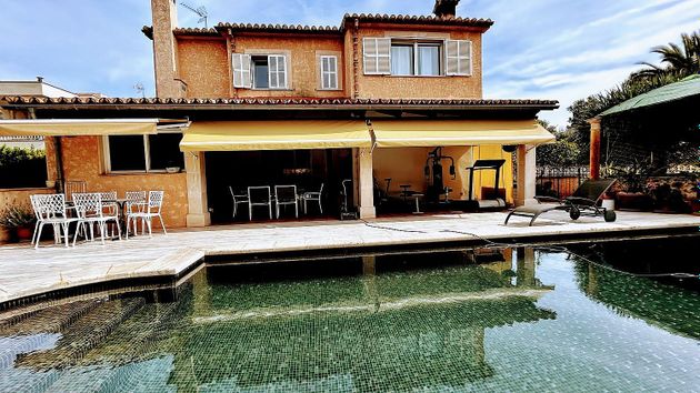Foto 1 de Venta de casa en Cala Blava-Bellavista de 5 habitaciones con terraza y piscina