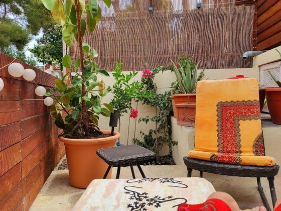 Foto 1 de Casa adossada en venda a Costa de la Calma de 1 habitació amb terrassa i jardí