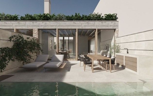 Foto 1 de Casa adossada en venda a calle De Mas de 3 habitacions amb terrassa i piscina