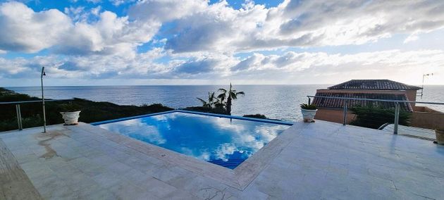 Foto 1 de Casa adossada en venda a Cala Magrana-Cala Anguila-Cala Mendia de 7 habitacions amb terrassa i piscina