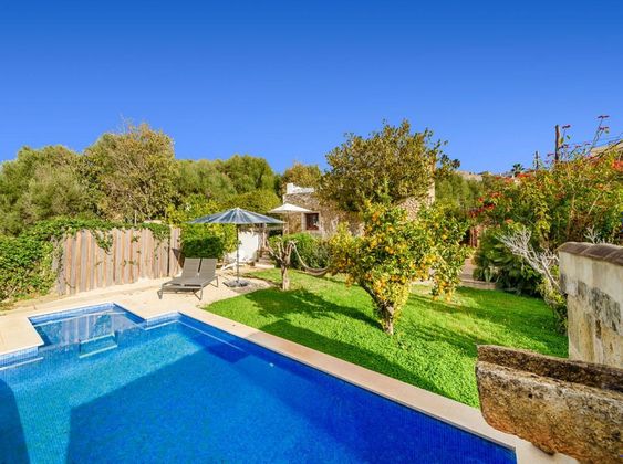 Foto 1 de Casa adossada en venda a Búger de 4 habitacions amb terrassa i piscina