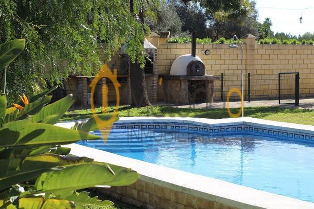 Foto 1 de Xalet en venda a Rinconada (La) de 3 habitacions amb piscina i jardí