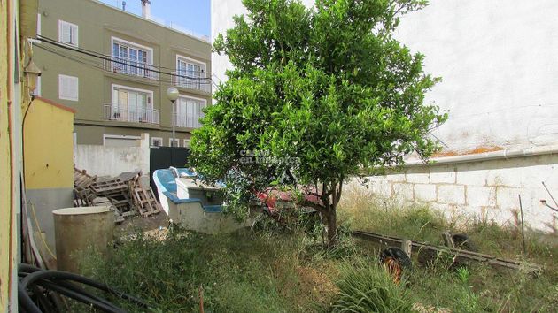 Foto 2 de Casa adosada en venta en Ciutadella de 3 habitaciones con terraza y jardín