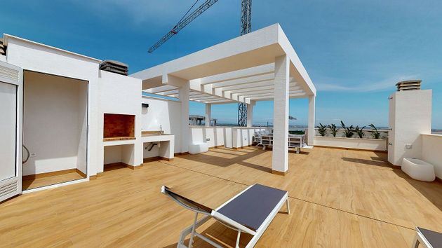 Foto 1 de Venta de piso en calle Teulada de 2 habitaciones con terraza y piscina