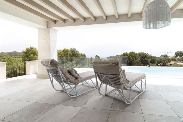 Foto 2 de Casa adosada en venta en Génova de 5 habitaciones con terraza y piscina