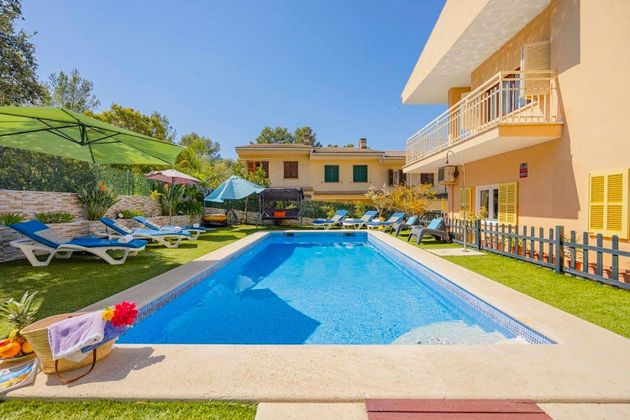 Foto 1 de Chalet en venta en Port d'Alcúdia - Platja d'Alcúdia de 5 habitaciones con terraza y piscina