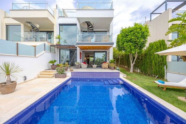 Foto 1 de Casa en venta en Port d'Alcúdia - Platja d'Alcúdia de 4 habitaciones con terraza y piscina