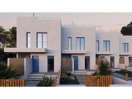 Foto 1 de Casa adossada en venda a Port d'Alcúdia - Platja d'Alcúdia de 3 habitacions amb piscina i jardí