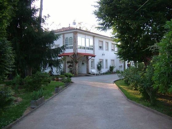 Foto 1 de Casa en venta en Vedra de 5 habitaciones con garaje y jardín