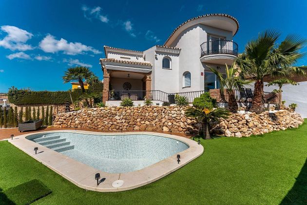 Foto 1 de Venta de chalet en Riviera del Sol de 3 habitaciones con piscina y garaje
