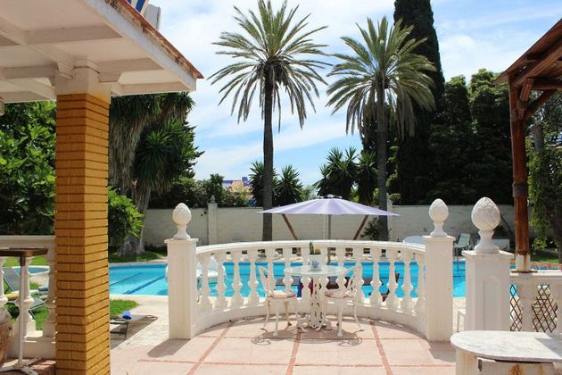 Foto 1 de Chalet en venta en El Pinillo de 6 habitaciones con terraza y piscina