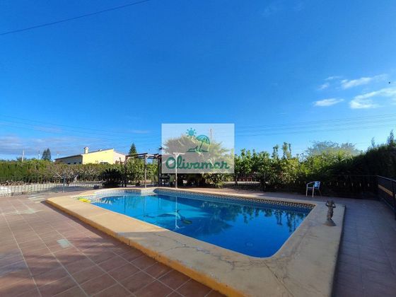 Foto 1 de Venta de chalet en calle Font del Bolo de 4 habitaciones con terraza y piscina