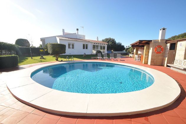 Foto 1 de Chalet en venta en Cala Blanca de 6 habitaciones con terraza y piscina