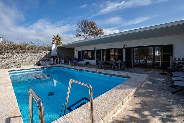 Foto 1 de Chalet en venta en Cala Blanca de 5 habitaciones con terraza y piscina