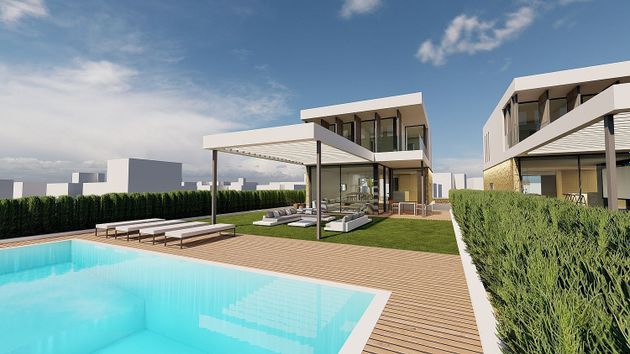Foto 2 de Xalet en venda a Cala Blanca de 4 habitacions amb terrassa i piscina