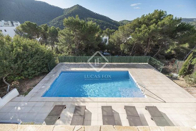 Foto 1 de Casa en venda a Santa Eulalia del Río de 2 habitacions amb piscina i jardí