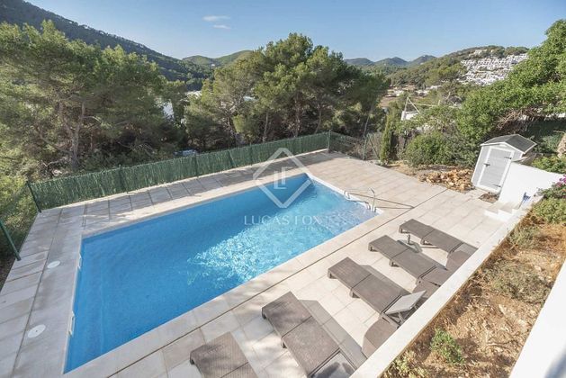 Foto 2 de Casa en venda a Santa Eulalia del Río de 2 habitacions amb piscina i jardí