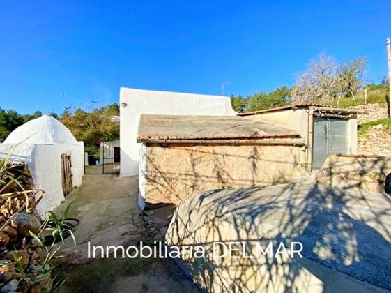 Foto 1 de Casa rural en venta en Sant Joan de Labritja de 3 habitaciones con terraza y jardín
