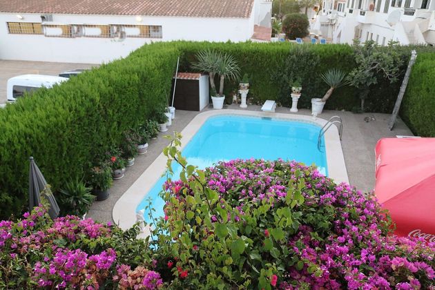 Foto 1 de Chalet en venta en Alaior de 3 habitaciones con terraza y piscina