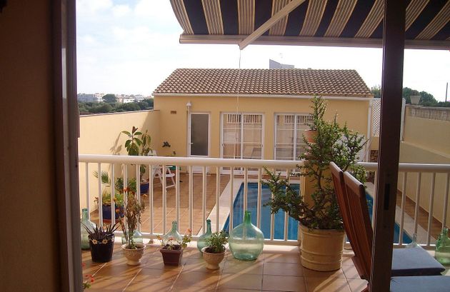 Foto 2 de Venta de casa adosada en Maó de 4 habitaciones con terraza y piscina