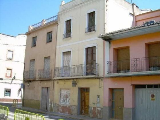 Foto 1 de Venta de casa en Villanueva de Castellón de 4 habitaciones con balcón