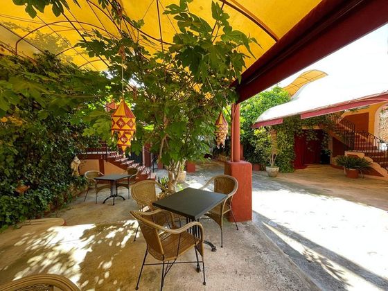 Foto 2 de Casa adosada en venta en El Terreno de 10 habitaciones con terraza y piscina