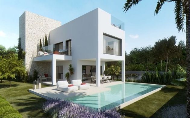 Foto 1 de Casa adossada en venda a Campos de 3 habitacions amb terrassa i piscina