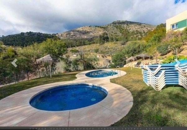 Foto 1 de Venta de casa en Benalmádena pueblo de 3 habitaciones con terraza y piscina