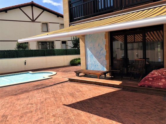 Foto 2 de Casa adossada en venda a Bareyo de 4 habitacions amb terrassa i piscina