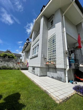 Foto 1 de Casa adossada en venda a Arnuero de 4 habitacions amb terrassa i piscina