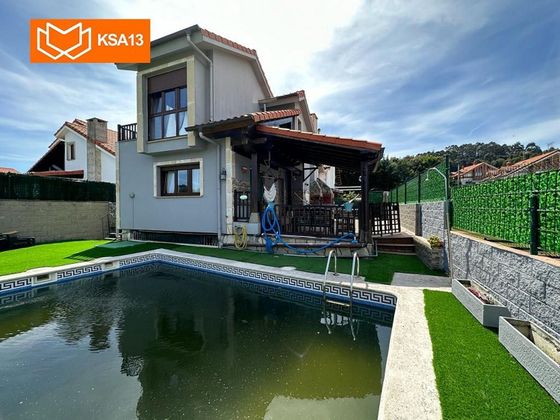 Foto 1 de Casa en venta en Arnuero de 3 habitaciones con terraza y piscina