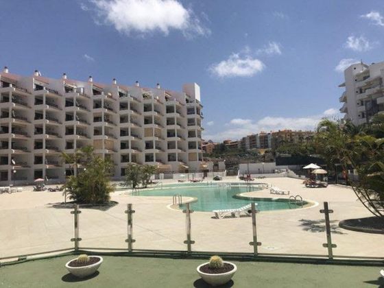 Foto 1 de Alquiler de ático en Los Cristianos - Playa de las Américas de 1 habitación con terraza y piscina